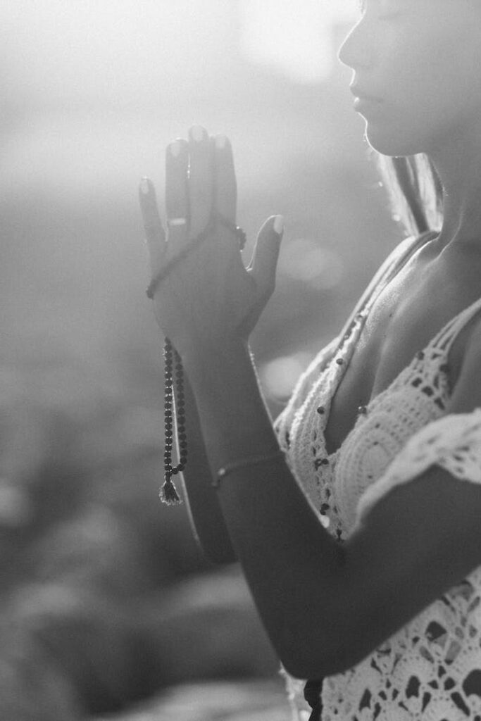 pexels photo 5201569 Woman practicing meditation outdoors in calm daylight with a boho vibe.